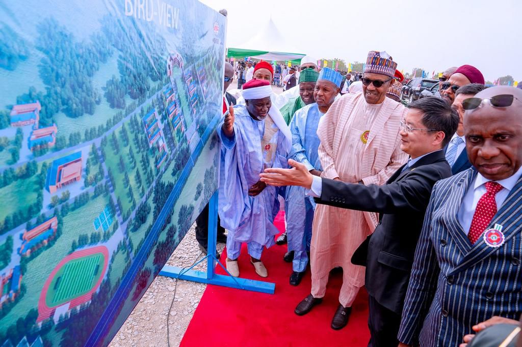 President Muhammadu Buhari performs the groundbreaking ceremony for the construction of University of Transportation, Daura. [Twitter/@BayoOmoboriowo]