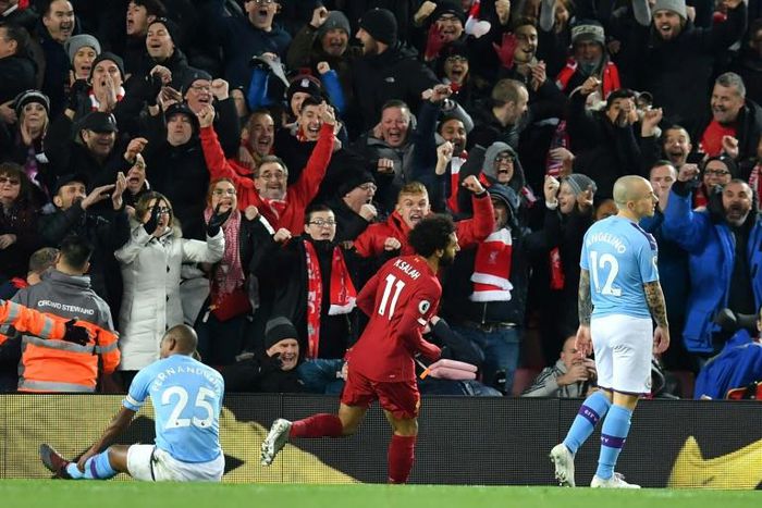 Mohamed Salah (C) celebrates scoring for leaders Liverpool in a Premier League victory over Manchester City last Sunday