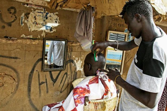 Young men are flocking to barbershops in Khartoum for modern hairstyles once banned under Omar al-Bashir's regime