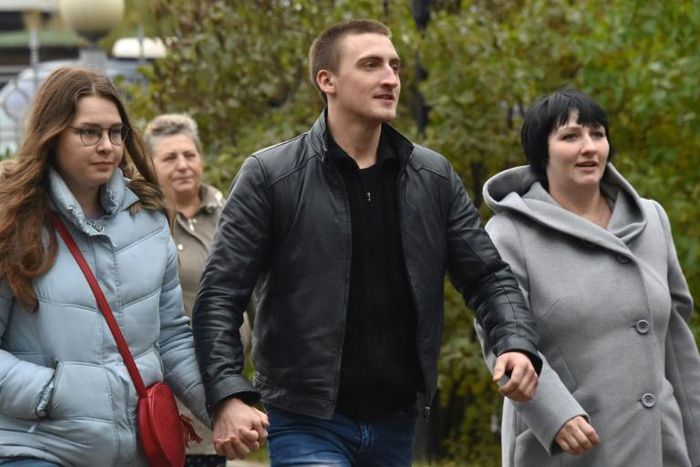 Ustinov (C) was released after prosecutors suddenly asked a court to give Ustinov a non-custodial sentence, saying his punishment was too harsh