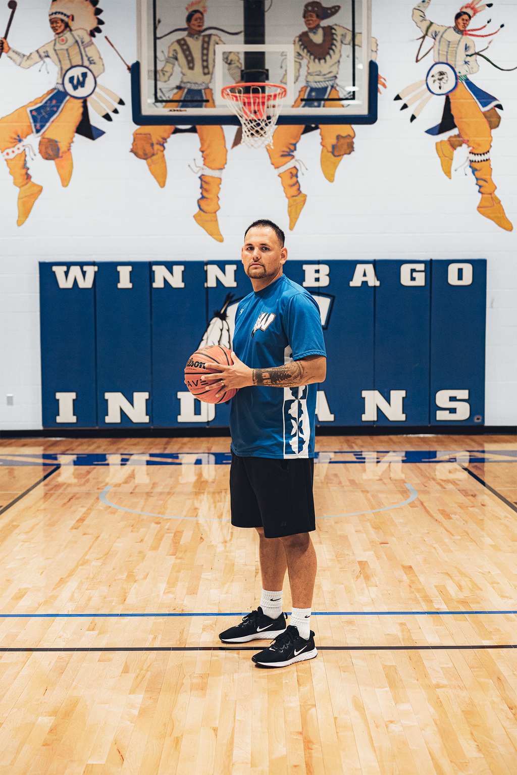 <strong>JEFF BERRIDGE, </strong>coach of the Winnebago Indians, in the schools gym.