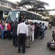 Nigerians board a bus heading to the O.R. Tambo International Airport, near Johannesburg, on their way out of South Africa [Twitter/@HeidiGiokos]