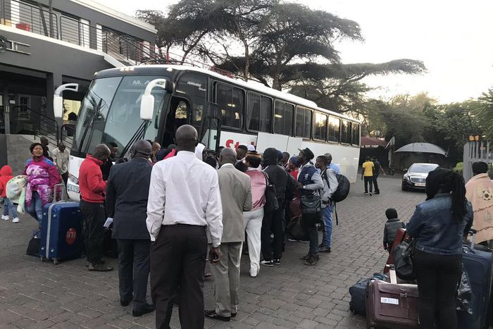 Nigerians board a bus heading to the O.R. Tambo International Airport, near Johannesburg, on their way out of South Africa [Twitter/@HeidiGiokos]