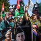 Rights experts have voiced alarm over the measures imposed by India since it revoked autonomous rule in the part of Kashmir it controls on August 5, including a near-total communications blackout; here, demonstrators protest against India