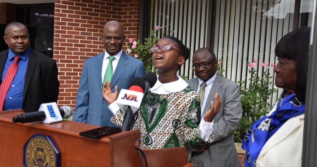 Miss Wealthy Morgan recites William Ernest Henley's Invictus. [NAN]