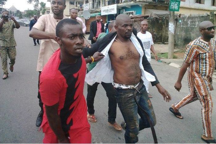 One of the suspected hoodlums caught after the APC secretariat was attacked