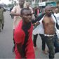 One of the suspected hoodlums caught after the APC secretariat was attacked