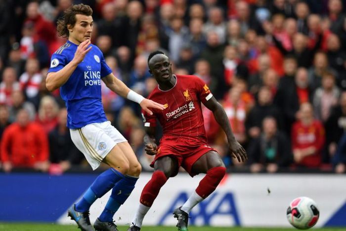 Senegalese Sadio Mane (R) scores for Liverpool against Leicester City at Anfield