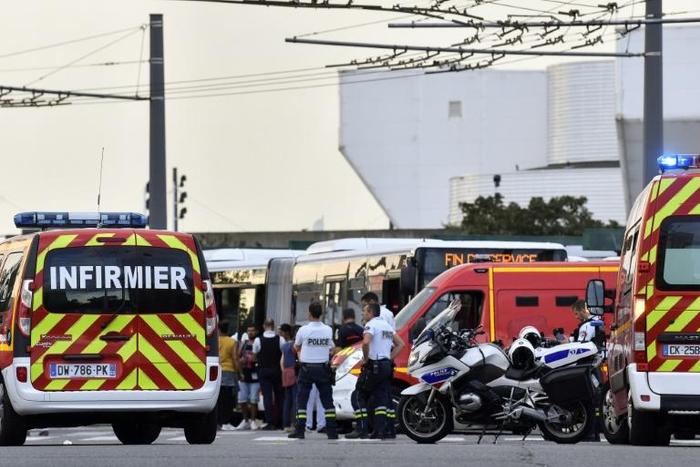 Emergency services are at work in Villeurbanne on the outskirts of Lyon, south-eastern France, after a knife attack