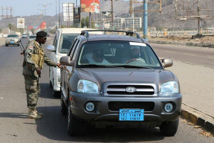 A fighter of the UAE-trained Security Belt Force mans a checkpoint in the Khor Maksar district of Yemen's second city of Aden