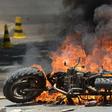 A motorbike burns in Cochabamba, a stronghold of Bolivia President Evo Morales, as clashes between his supporters and those of rival Carlos Mesa continue