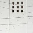 A wall riddled with bullet holes is seen after heavily armed gunmen waged an all-out battle against Mexican security forces in Culiacan