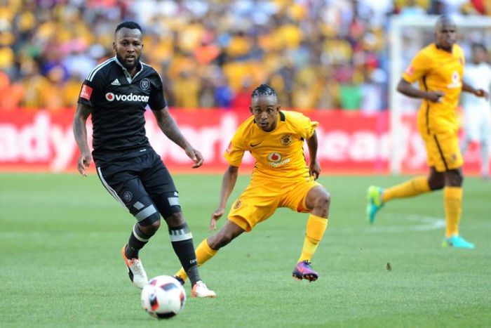 A file photo of Mpho Makola (L) playing for former club Orlando Pirates. He has been banned for six months after shoving a referee