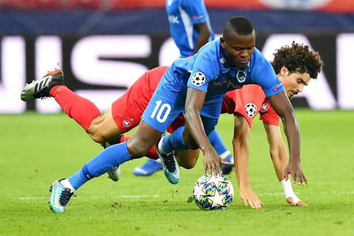Mbwana Samatta, in the blue of Genk, scraps for possession in the Belgian side's defeat against Salzburg with which they began their Champions League campaign