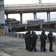 A large number of police cars and armed personnel carriers were at the scene, while special forces and snipers guarded the bridge after the man used his vehicle to block the bridge across the Dnipro river