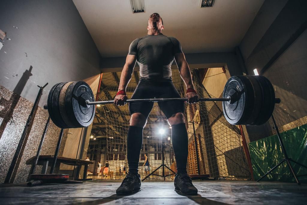 Strong man doing weight training