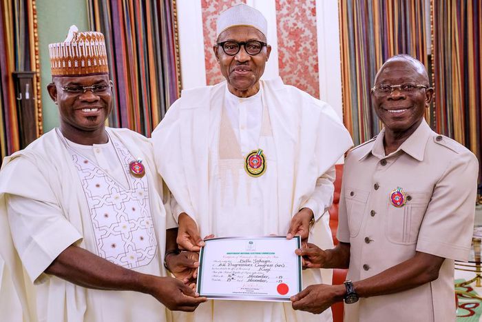 The re-elected Governor of Kogi, Yahaya Bello presented his Certificate of Return to President Muhammadu Buhari in the presence of Adams Oshiomhole, National Chairman of the All Progressives Congress (APC). [Twitter/@BashirAhmaad]