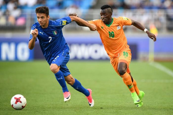 A file photo of Zambia forward Fashion Sakala (R) playing against Italy during the 2017 FIFA U20 World Cup in South Korea