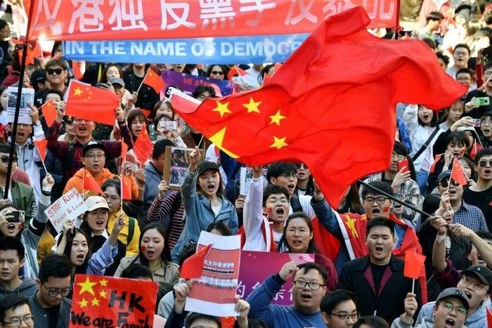Pro-China demonstrators march through Sydney in response to rallies in support of the Hong Kong protestors