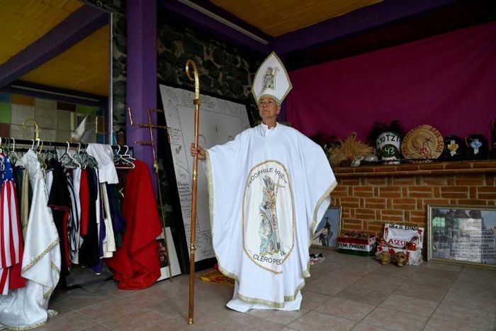 Mexican activist Julia Klug poses on August 8, 2019 in Mexico City wearing a pope-like outfit she wore to protest against the Catholic church