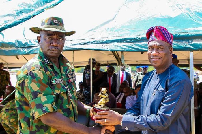 L-R; GOC 81 Division, Nigerian Army, Maj. Gen. John Irefin, presenting an award to the Lagos State Deputy Governor, Dr Obafemi Hamzat, at the 81 Division Nigeria Army flag off of Exercise Crocodile Smile IV at Takwa Bay, Lagos.(NAN)