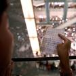 Protesters have gathered at Hong Kong malls to sing a new anthem penned by an anonymous composer