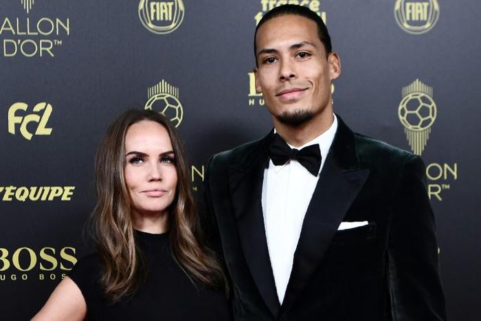 Liverpool defender Virgil van Dijk and his wife Rike Nooitgedagt arrive at the Ballon d'Or ceremony in Paris on December 2, 2019