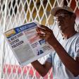 A man reads the last edition of 'El Nuevo Diario' newspaper in Managua on September 27, 2019