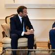 French President Emmanuel Macron (left) meets Ukrainian film director Oleg Sentsov, released last month by Russia in a prisoner swap with Kiev