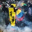 Demonstrators clash with riot police during a nationwide strike called by students, unions and indigenous groups to protest against the government of Colombia's President Ivan Duque, in Bogota, on November 21, 2019
