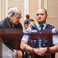 Australian Cardinal George Pell is escorted into the Supreme Court at the start of his appeal against conviction on child sex abuse charges. He will hear the court's decision this week
