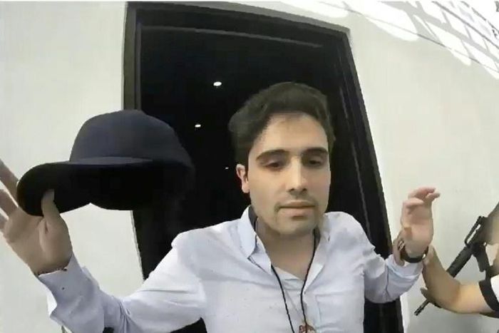 A screenshot of a handout video released by the Mexican government on October 30, 2019 shows the moment alleged trafficker Ovidio Guzman, son of jailed drug kingpin Joaquin "Chapo" Guzman was arrested October 17, 2019