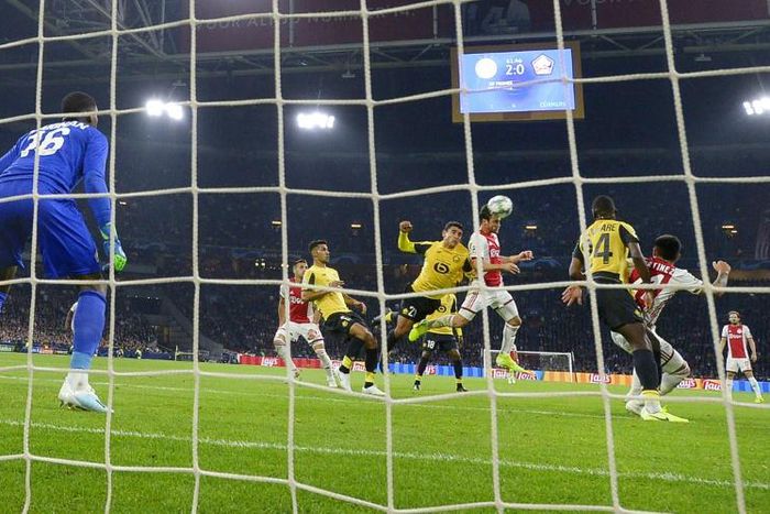 Nicolas Tagliafico crashed home the third as Ajax cruised past Lille in their Champions League opener