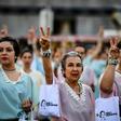 Women dressed as 1950's icon Eva Peron take part in a demonstration against President Mauricio Macri as campaigning for Argentina's October 27 elections heats up