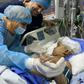 The girls were separated in a marathon operation by a huge team of Hungarian and Bangladeshi doctors