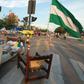 A supporter of Bolivian opposition candidate Carlos Mesa blocks an avenue in Santa Cruz