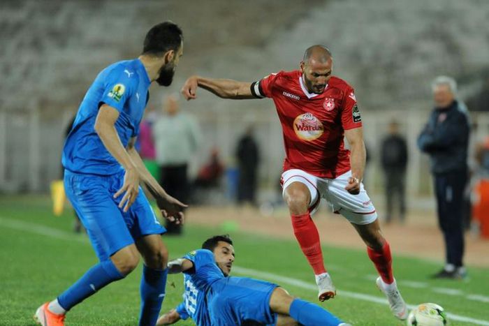 A file photo of Etoile Sahel midfielder Yassine Chikhaoui (R), whose goal beat Al Ahly of Egypt in a CAF Champions League Group B match Friday