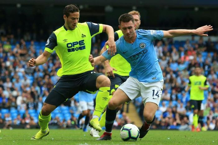 Egyptian Ramadan Sobhy (L) playing for Huddersfield Town against Manchester City last year