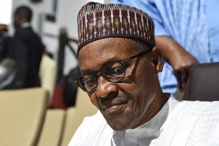 South Africa's financial capital and surrounding areas were rocked by a surge of deadly attacks against foreigners, many directed against Nigerian-owned businesses and properties; Nigerian president Muhammadu Buhari in an image from July 7, 2019
