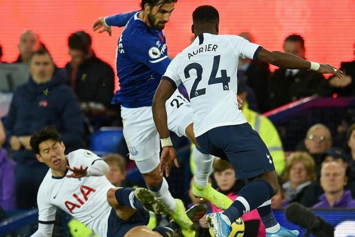 Everton midfielder Andre Gomes (centre) was injured following a challenge by Tottenham's Son Heung-min (left)