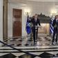 NATO's General Secretary Jens Stoltenberg (L) speaks next to Greek Prime Minister Kyriakos Mitsotakis during a press conference after their meeting in Athens on October 10, 2019