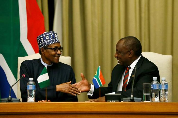 Handshake: Buhari, left, and Ramaphosa