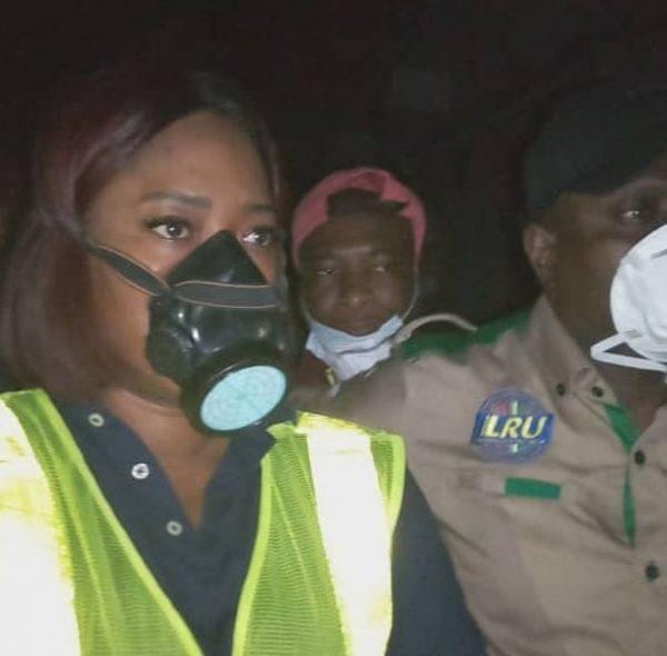 An official of LASEPA wears mouth guard at the container site. [Tribune]