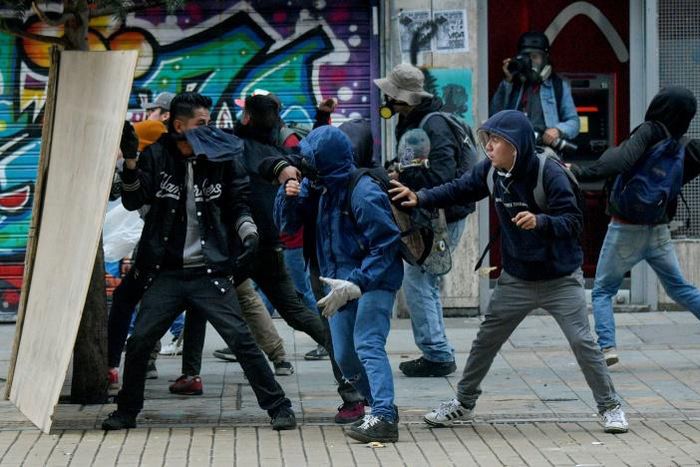 Demonstrators clash with police in Colombia's capital on November 22, 2019