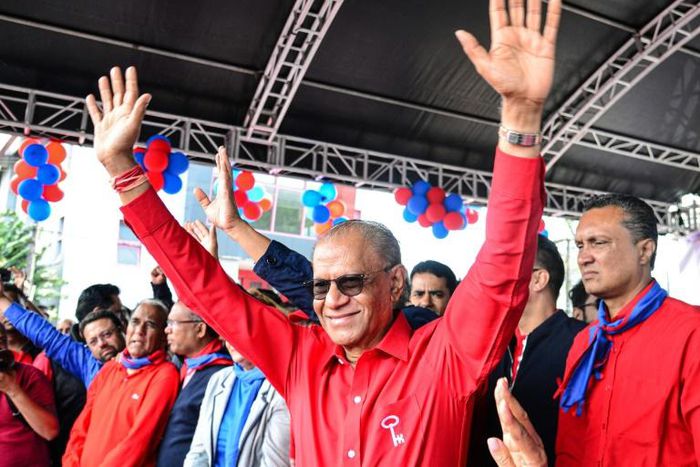 Navin Ramgoolam (C)
is one of the rivals running against the prime minister