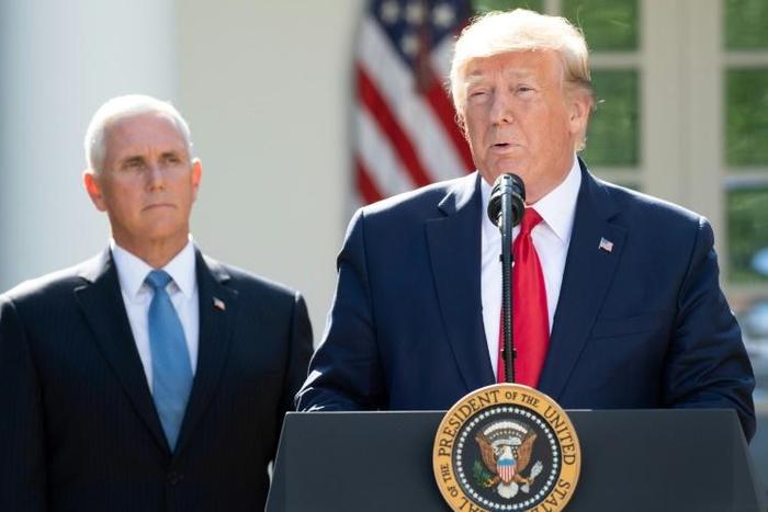 US President Donald Trump (R), said he will send Vice President Mike Pence (L) to Poland for World War II anniversary commemorations