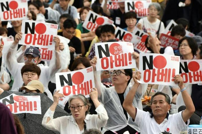 Seoul's decision to end the military intel-sharing pact is the latest in a series of tit-for-tat measures triggered by a run of South Korean court rulings against Japanese firms, requiring them to pay for forced labour during World War II