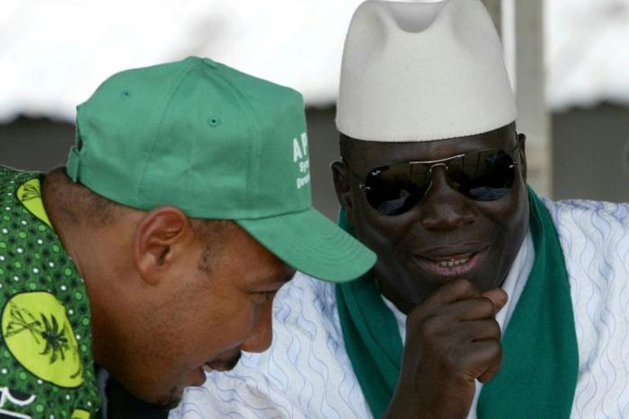 Gambia's former president Yahya Jammeh (R) and ex-army captain Edward Singhateh, both seen here in 2006, were close allies