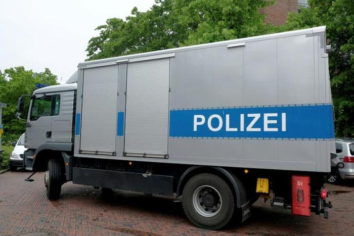 German prosecutors are investigating a male nurse suspected of murdering numerous patients in a case reminiscent of one of the country's worst serial killers; a June 6, 2019 image of a police truck at the trial against former nurse Niels Hoegel, accuse...