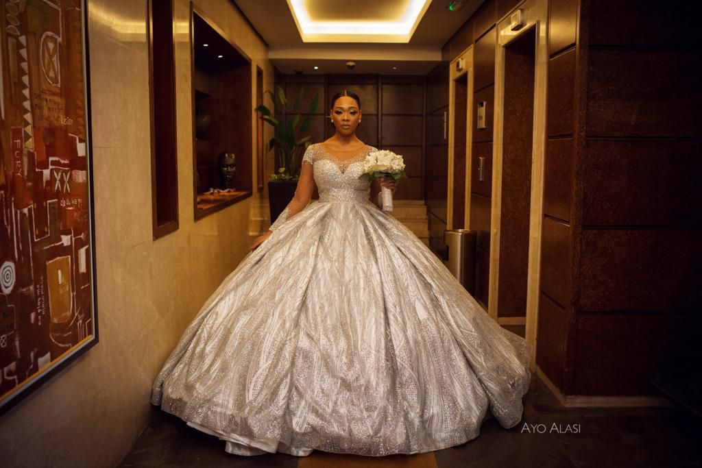Stunning photos from nightlife king, Temidayo L. Kafaru (Lascatter's) top colourful wedding